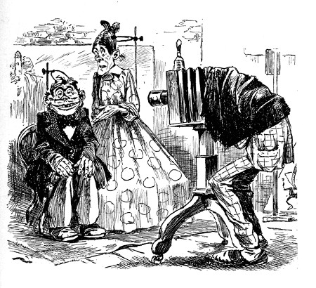 Under Her Breath.—Mrs. Conlan: "Whisht, Pat!"

Pat: "Whisht, Dalia!"

Mrs. Conlan: "Aise yure face. It's an upright we're havin' took."

From the New York "Judge."

SELECTED BY MR. RAVEN-HILL.